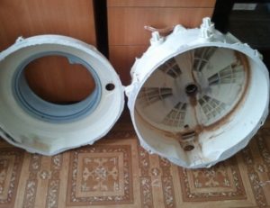 Paano i-disassemble ang isang nakadikit na tangke ng washing machine?