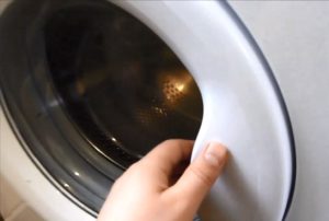Cum se deschide ușa mașinii de spălat Kandy dacă mânerul este rupt?