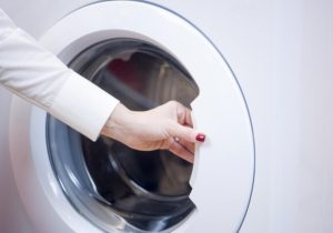 How to open the door of an Electrolux washing machine?