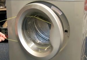 Comment ouvrir la porte d'une machine à laver Kandy