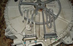 How to replace the heating element in a Haier washing machine?