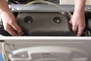 Paano baguhin ang sinturon sa isang Vestel washing machine