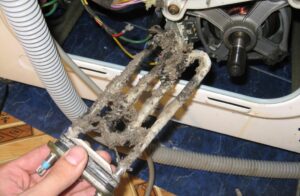 How to remove the heating element from an LG washing machine