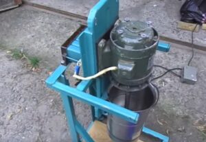 Triturador-picador para maçãs de uma máquina de lavar