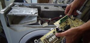How to replace the control module in a washing machine
