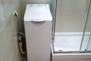 Como conectar uma máquina de lavar com carregamento superior?