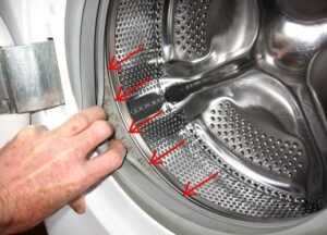 Kā pievilkt bungu veļas mašīnā