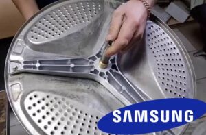 Bagaimana untuk menggantikan salib dram mesin basuh Samsung