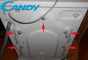 Where are the shipping bolts on the Candy washing machine?